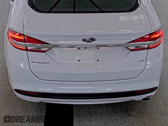 2018 Ford Fusion SE z VIN 3FA6P0H79JR171487, wystawiony jako IAAI lot #42418974 z przebiegiem 55 846 mil mil oraz . Historia ofert i sprzedaży dostępna na DreamBid. Obrazek 1.