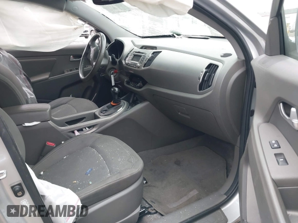 2011 Kia Sportage EX with VIN KNDPC3A25B7051396, listed as a IAAI auction lot 38855292 with 263,407 mi miles and . Bid and sale history available at DreamBid. Image 5.