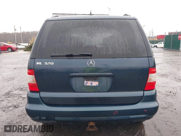 2003 Mercedes-Benz M-Class 3.2L with VIN 4JGAB54EX3A390987, listed as a IAAI auction lot 41482335 with 191,381 mi miles. Bid and sale history available at carsss.com. Image 16.