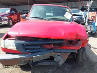2002 Mazda B-Series Truck SX with VIN 4F4YR12D02TM01264, listed as a IAAI auction lot 41908459 with 205,445 mi miles and . Bid and sale history available at DreamBid. Image 13.