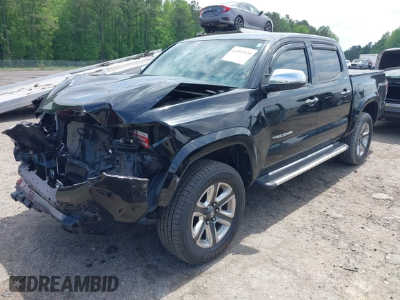 2016 Toyota Tacoma Limited with VIN 3TMEZ5CN4GM024275, listed as a IAAI auction lot 42093920 with 79,208 mi miles and . Bid and sale history available at DreamBid. Image 2.