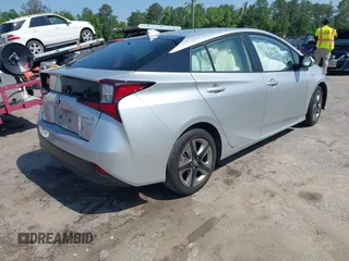 2021 Toyota Prius L Eco z VIN JTDKAMFU5M3137298, wystawiony jako IAAI lot #42270937 z przebiegiem 38 828 mil mil oraz . Historia ofert i sprzedaży dostępna na DreamBid. Obrazek 4.