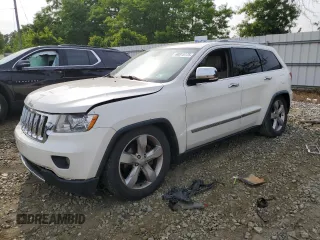2011 Jeep Grand Cherokee Overland with VIN 1J4RR6GG4BC670455, listed as a Copart auction lot 60815175 with 257,999 mi miles and Salvage title. Bid and sale history available at DreamBid. Image 1.