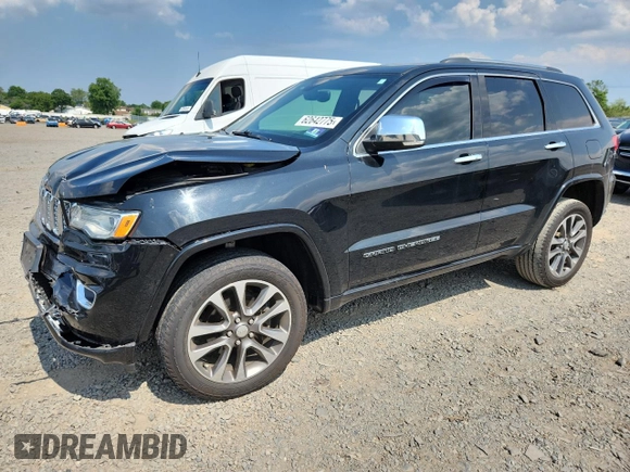 2017 Jeep Grand Cherokee Overland z VIN 1C4RJFCG4HC818132, wystawiony jako Copart lot #62642775 z przebiegiem 116 815 mil mil oraz Szkoda całkowita • Salvage title. Historia ofert i sprzedaży dostępna na DreamBid. Obrazek 1.