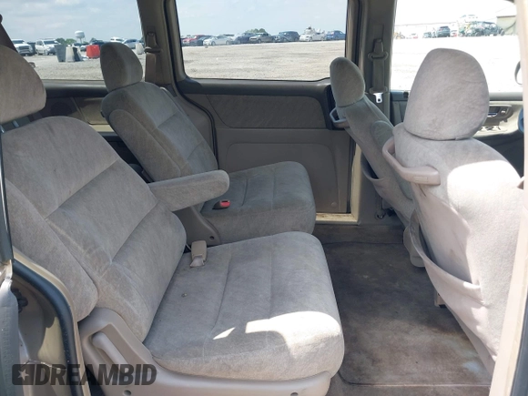 2000 Honda Odyssey EX with VIN 2HKRL1868YH513587, listed as a IAAI auction lot 42092115 with 302,555 mi miles and . Bid and sale history available at DreamBid. Image 8.