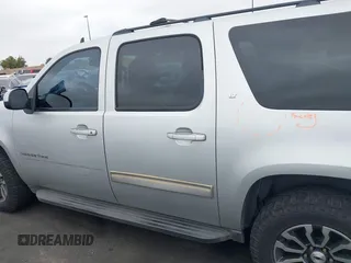 2010 Chevrolet Suburban LT with VIN 1GNUCJE03AR238548, listed as a IAAI auction lot 42104596 with 153,959 mi miles and . Bid and sale history available at DreamBid. Image 14.