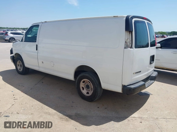 2019 Chevrolet Express Cargo Van with VIN 1GCWGAFP0K1163129, listed as a IAAI auction lot 41984551 with 50,069 mi miles. Bid and sale history available at carsss.com. Image 3.