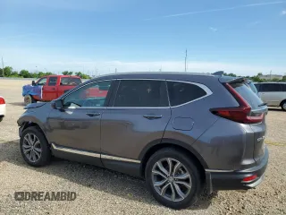 2020 Honda CR-V Touring with VIN 2HKRW2H99LH677964, listed as a Copart auction lot 61169915 with 65,915 mi miles and Salvage title. Bid and sale history available at DreamBid. Image 2.