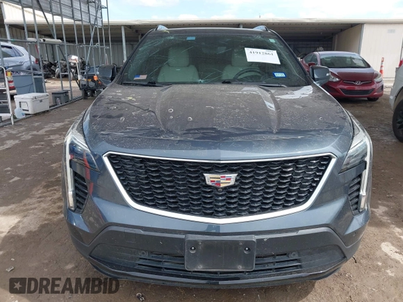 2019 Cadillac XT4 FWD Sport z VIN 1GYFZER49KF215843, wystawiony jako IAAI lot #41912861 z przebiegiem 102 922 mil mil oraz . Historia ofert i sprzedaży dostępna na DreamBid. Obrazek 12.