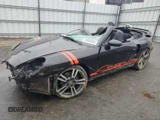 1999 Porsche 911 z VIN WP0CA2990XS651649, wystawiony jako Copart lot #45002045 z przebiegiem Nie podano mil oraz Szkoda całkowita • Salvage title. Historia ofert i sprzedaży dostępna na DreamBid. Obrazek 1.