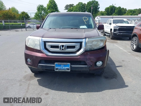 2011 Honda Pilot EX-L with VIN 5FNYF4H59BB090116, listed as a IAAI auction lot 42048811 with 158,857 mi miles and . Bid and sale history available at carsss.com. Image 11.
