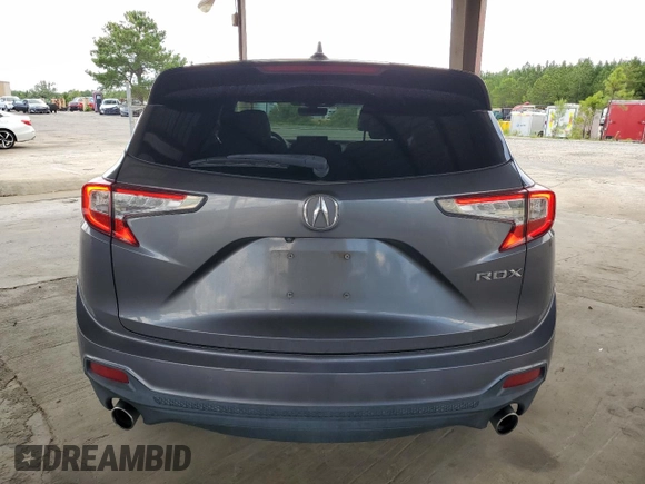 2020 Acura RDX Technology with VIN 5J8TC1H54LL004003, listed as a Copart auction lot 61156075 with 135,236 mi miles and Clean title. Bid and sale history available at DreamBid. Image 6.