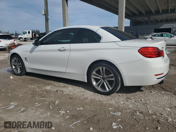 2016 BMW 4 Series 428i xDrive with VIN WBA3T1C52GP822072, listed as a Copart auction lot 87244184 with 80,946 mi miles and Salvage title. Bid and sale history available at DreamBid. Image 2.