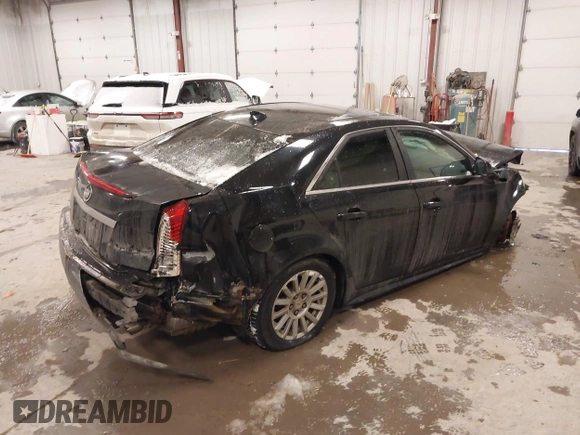 2010 Cadillac CTS with VIN 1G6DA5EG0A0110892, listed as a IAAI auction lot 41321333 with 112,851 mi miles and . Bid and sale history available at DreamBid. Image 4.