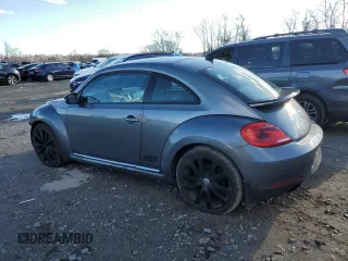 2012 Volkswagen Beetle 2.0T Turbo w/Sun/Snd/Nav PZEV with VIN 3VWVA7AT9CM663246, listed as a Copart auction lot 86379894 with 145,326 mi miles and Salvage Title. Bid and sale history available at carsss.com. Image 2.