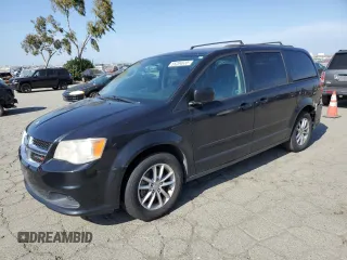 2014 Dodge Grand Caravan SXT z VIN 2C4RDGCG0ER321403, wystawiony jako Copart lot #55204635 z przebiegiem 219 510 mil mil oraz Tytuł czysty. Historia ofert i sprzedaży dostępna na DreamBid. Obrazek 1.