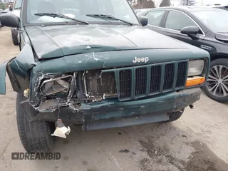 2000 Jeep Cherokee with VIN 1J4FT48S6YL102373, listed as a IAAI auction lot 41685817 with 214,106 mi miles and . Bid and sale history available at DreamBid. Image 6.