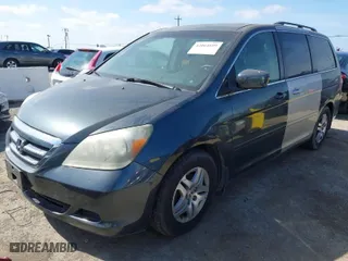 2006 Honda Odyssey EX-L with VIN 5FNRL38706B081643, listed as a IAAI auction lot 42064699 with 204,918 mi miles. Bid and sale history available at carsss.com. Image 2.