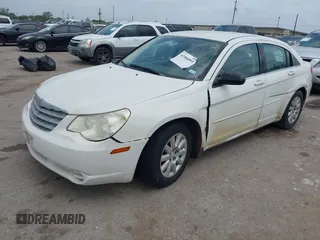 2008 Chrysler Sebring LX with VIN 1C3LC46K78N211784, listed as a IAAI auction lot 41966093 with 147,753 mi miles and . Bid and sale history available at DreamBid. Image 2.