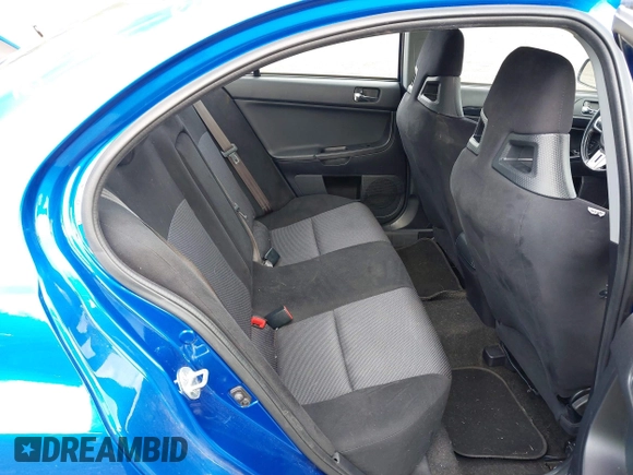 2015 Mitsubishi Lancer Evolution GSR with VIN JA32W8FV4FU012578, listed as a IAAI auction lot 41730742 with 64,762 mi miles. Bid and sale history available at carsss.com. Image 8.