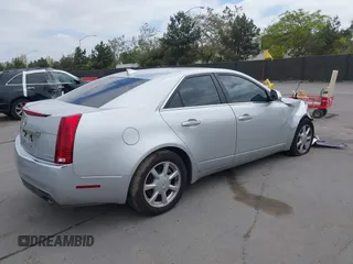 2009 Cadillac CTS RWD с VIN 1G6DF577690160058, выставлен на аукционе IAAI как лот 42108078 с пробегом 114 381 миль миль и . История ставок и продаж доступна на DreamBid. Изображение 4.