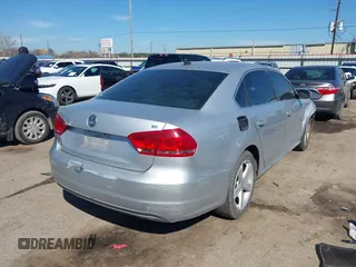 2013 Volkswagen Passat SE w/Sunroof with VIN 1VWBH7A34DC003147, listed as a IAAI auction lot 41662970 with 153,897 mi miles. Bid and sale history available at carsss.com. Image 4.