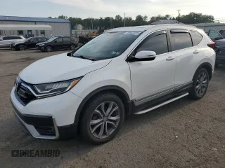 2020 Honda CR-V Touring z VIN 2HKRW2H97LH673556, wystawiony jako Copart lot #59882095 z przebiegiem 63 135 mil mil oraz Szkoda całkowita • Salvage title. Historia ofert i sprzedaży dostępna na DreamBid. Obrazek 1.