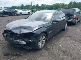 2015 BMW 7 Series 740Li xDrive with VIN WBAYF4C55FG291723, listed as a IAAI auction lot 42694382 with 101,140 mi miles and . Bid and sale history available at DreamBid. Image 18.