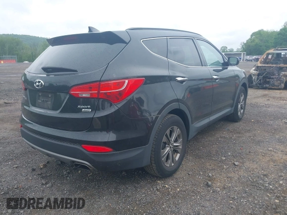 2014 Hyundai Santa Fe z VIN 5XYZUDLB9EG224174, wystawiony jako IAAI lot #42244140 z przebiegiem 84 341 mil mil oraz . Historia ofert i sprzedaży dostępna na DreamBid. Obrazek 4.