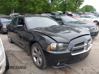 2011 Dodge Charger SE with VIN 2B3CL3CG3BH512706, listed as a IAAI auction lot 42122199 with 181,258 mi miles and . Bid and sale history available at carsss.com. Image 1.