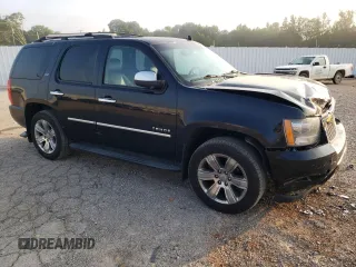 2014 Chevrolet Tahoe LTZ с VIN 1GNSKCE07ER137878, выставлен на аукционе Copart как лот 59905605 с пробегом 213 584 миль миль и Списание • Salvage title. История ставок и продаж доступна на DreamBid. Изображение 4.