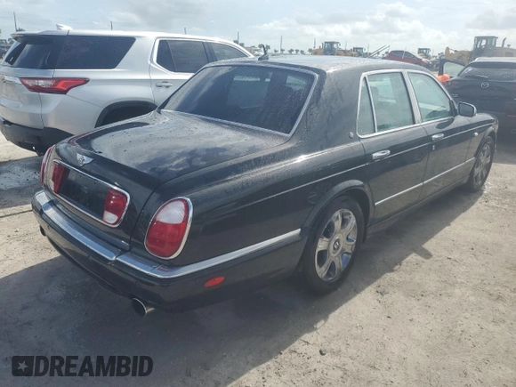 2006 Bentley Arnage R с VIN SCBLC37F26CX11385, выставлен на аукционе Copart как лот 76563524 с пробегом 23 197 миль миль и Списание • Salvage title. История ставок и продаж доступна на DreamBid. Изображение 3.