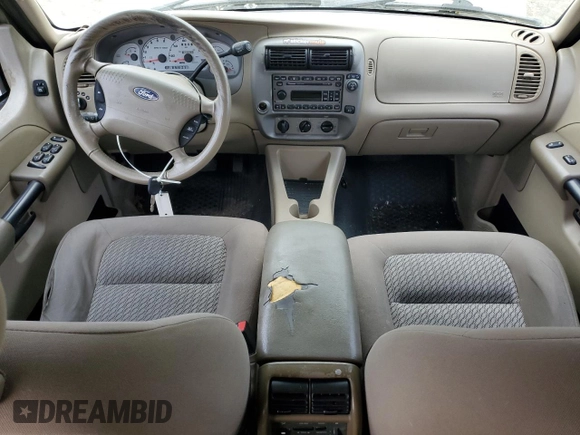 2003 Ford Explorer Sport Trac XLS with VIN 1FMZU67E13UB28854, listed as a Copart auction lot 50653695 with 179,040 mi miles and Salvage title. Bid and sale history available at DreamBid. Image 8.