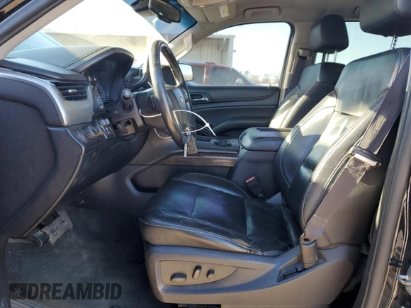 2015 Chevrolet Suburban LT with VIN 1GNSKJKC2FR274506, listed as a Copart auction lot 87881695 with 196,506 mi miles and Salvage Title. Bid and sale history available at DreamBid. Image 7.