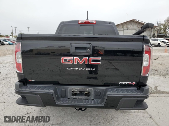 2022 GMC Canyon 4WD AT4 w/Leather with VIN 1GTG6FEN2N1294071, listed as a Copart auction lot 84652954 with 53,076 mi miles and Salvage Title. Bid and sale history available at carsss.com. Image 6.