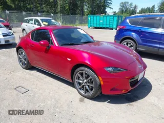 2020 Mazda MX-5 Miata Grand Touring z VIN JM1NDAM75L0416654, wystawiony jako IAAI lot #42359311 z przebiegiem 9 956 mil mil oraz . Historia ofert i sprzedaży dostępna na DreamBid. Obrazek 1.