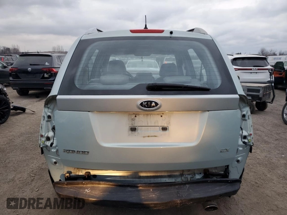 2007 Kia Rondo LX Base with VIN KNAFG525X77093670, listed as a Copart auction lot 87956025 with 138,330 mi miles and Salvage Title. Bid and sale history available at carsss.com. Image 6.