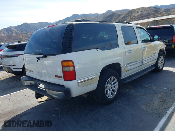 2001 GMC Yukon XL SLE with VIN 3GKFK16TX1G276201, listed as a IAAI auction lot 41537220 with 150,495 mi miles. Bid and sale history available at carsss.com. Image 4.