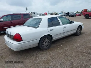 2009 Mercury Grand Marquis LS with VIN 2MEHM75V99X623036, listed as a IAAI auction lot 42087957 with 208,652 mi miles. Bid and sale history available at carsss.com. Image 4.