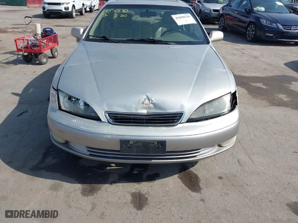 1999 Lexus ES 300 Luxury Sport Sdn with VIN JT8BF28G0X5065060, listed as a IAAI auction lot 41850130 with 1 mi miles. Bid and sale history available at carsss.com. Image 6.