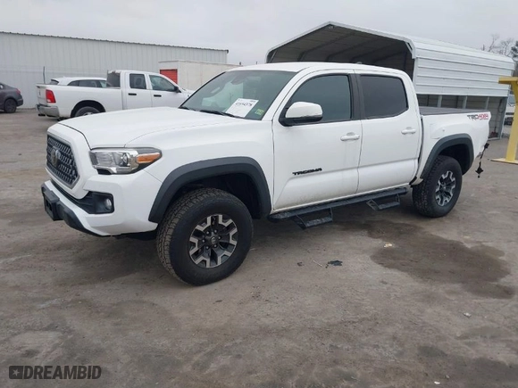 2019 Toyota Tacoma 4WD SR with VIN 5TFCZ5ANXKX204955, listed as a IAAI auction lot 41694378 with 108,410 mi miles. Bid and sale history available at carsss.com. Image 2.