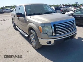 2012 Ford F-150 XL with VIN 1FTFW1CF5CFA70450, listed as a IAAI auction lot 42011336 with 250,384 mi miles. Bid and sale history available at carsss.com. Image 1.
