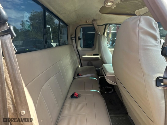 1999 Ford F-150 Work Series with VIN 1FTRX17W5XNC03174, listed as a Copart auction lot 87051864 with 210,577 mi miles and Clean Title. Bid and sale history available at carsss.com. Image 6.