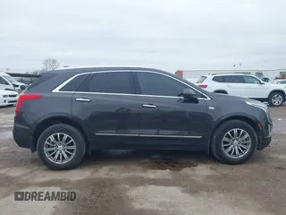 2017 Cadillac XT5 Luxury AWD z VIN 1GYKNDRS9HZ184992, wystawiony jako IAAI lot #41958484 z przebiegiem 124 941 mil mil oraz . Historia ofert i sprzedaży dostępna na DreamBid. Obrazek 13.