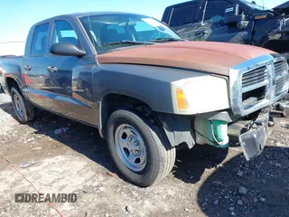 2006 Dodge Dakota ST z VIN 1D7HE28K76S560008, wystawiony jako IAAI lot #42176260 z przebiegiem 199 518 mil mil oraz . Historia ofert i sprzedaży dostępna na DreamBid. Obrazek 1.