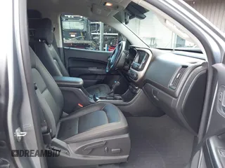 2021 GMC Canyon 4WD AT4 z VIN 1GTG6FEN8M1275345, wystawiony jako IAAI lot #42045878 z przebiegiem 68 299 mil mil oraz . Historia ofert i sprzedaży dostępna na DreamBid. Obrazek 5.