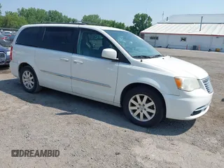 2012 Chrysler Town & Country Touring z VIN 2C4RC1BG7CR308789, wystawiony jako IAAI lot #42461295 z przebiegiem 170 488 mil mil oraz . Historia ofert i sprzedaży dostępna na DreamBid. Obrazek 1.