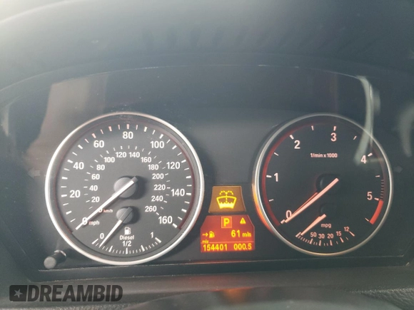 2012 BMW X5 35d with VIN 5UXZW0C53CL671564, listed as a Copart auction lot 60880715 with 154,401 mi miles and Clean title. Bid and sale history available at DreamBid. Image 9.