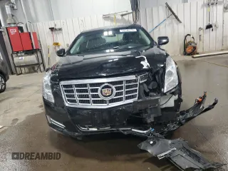 2014 Cadillac XTS Luxury z VIN 2G61N5S35E9133430, wystawiony jako Copart lot #54746235 z przebiegiem 157 544 mil mil oraz Szkoda całkowita • Salvage title. Historia ofert i sprzedaży dostępna na DreamBid. Obrazek 5.