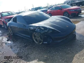 2021 Porsche Taycan 4S z VIN WP0AB2Y1XMSA43765, wystawiony jako IAAI lot #41956812 z przebiegiem 40 356 mil mil oraz . Historia ofert i sprzedaży dostępna na DreamBid. Obrazek 1.